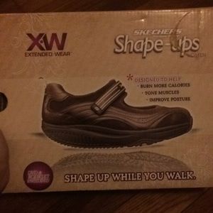 Dark brown sketchers shape up. Sneakers